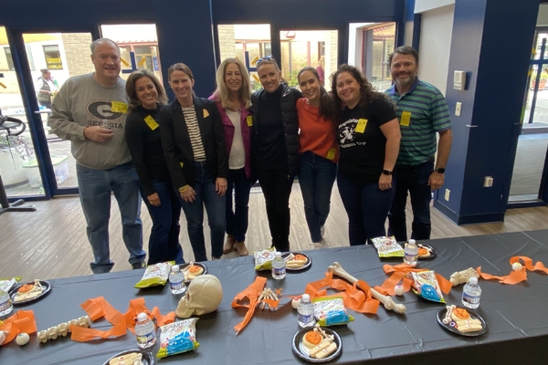 Intermediate parent volunteers at Halloween