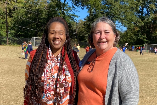 Two teachers smiling