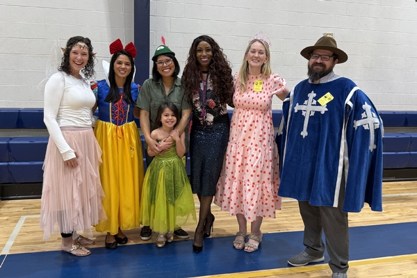 Parent volunteers dressed up as fairytale characters